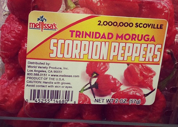 Package of Trinidad Moruga scorpion peppers labeled with 2,000,000 Scoville heat units related to food thieves lesson.
