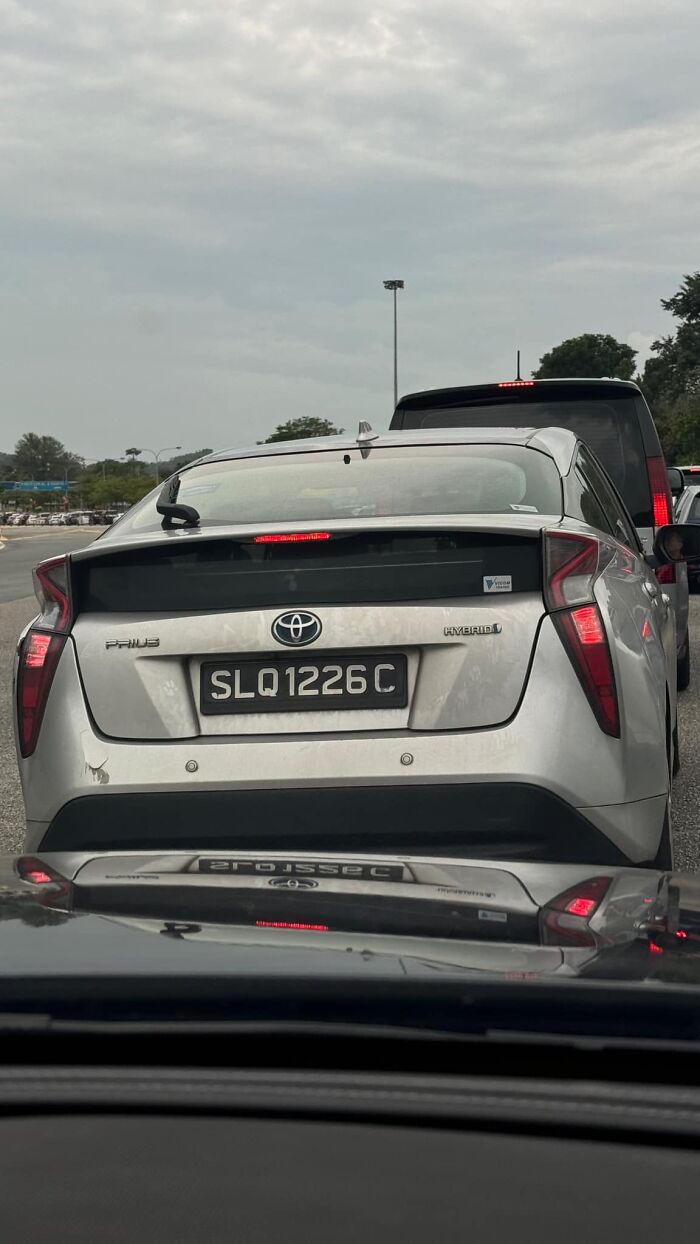 “Crazy” Woman Jumps In Front Of Vehicle So Her Husband Can Cut In Line “Crazy” Woman Jumps In Front Of Vehicle So Her Husband Can Cut In Line