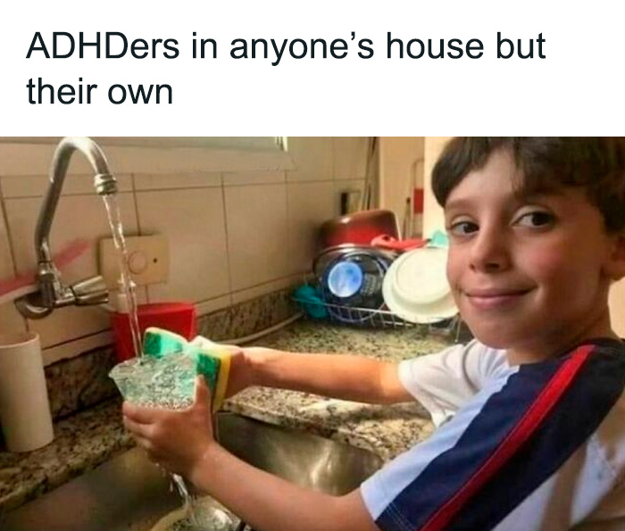 Child smiling while washing dishes, illustrating a relatable ADHD meme.