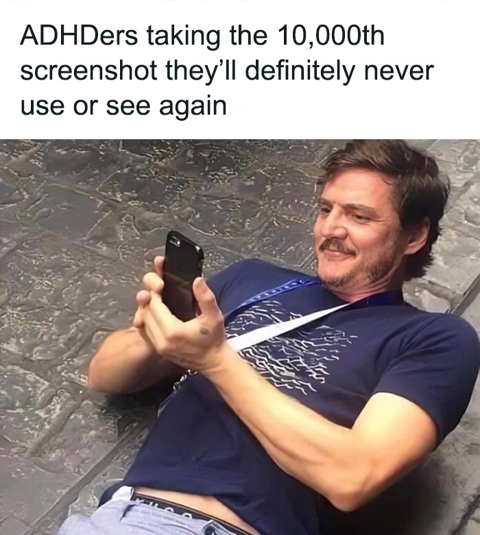 Man lying down, smiling at phone, illustrating a relatable ADHD meme about taking unnecessary screenshots.