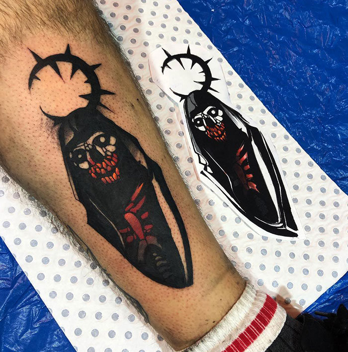Dark-themed tattoo ideas for men featuring a skeletal reaper figure in a black cloak with a red skeletal chest, highlighted by a spiked halo, creating a bold and eerie design.