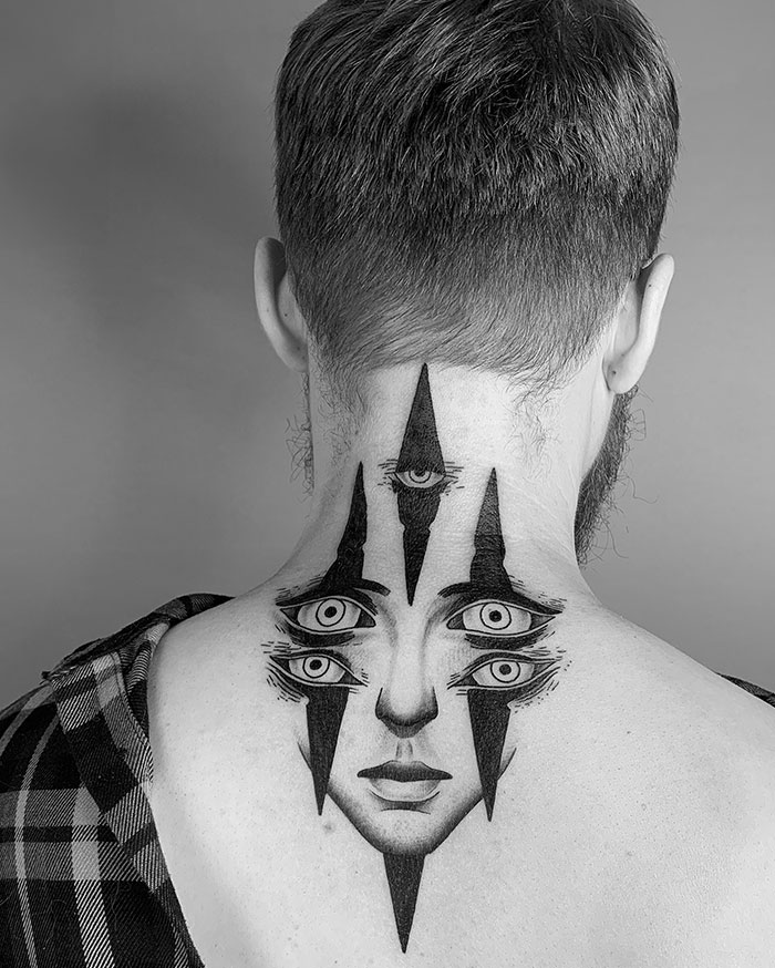  A surreal neck tattoo featuring a symmetrical design of multiple eyes within black geometric shapes, creating an eerie yet artistic visual effect. Tattoo ideas for men looking for bold and unique statement pieces.