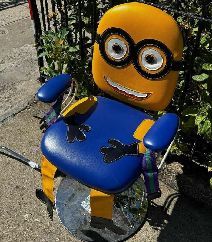 Minion-themed chair spotted on a curb in NYC, part of Stooping NYC treasures.