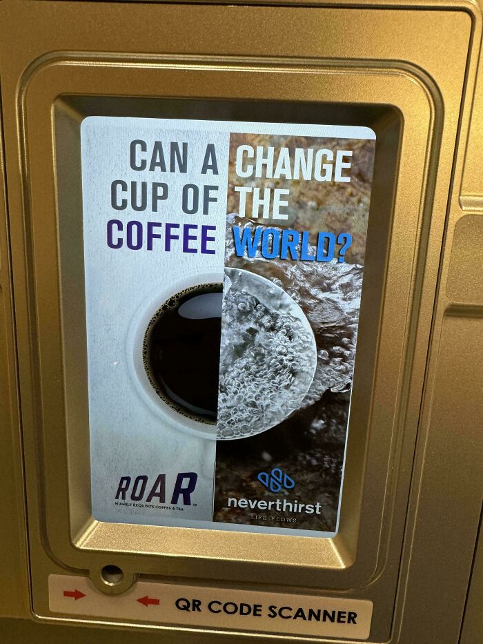 Sign asking "Can a cup of coffee change the world?" with a QR code scanner below.