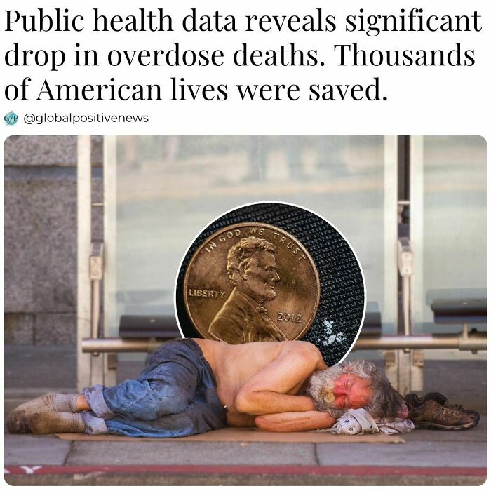 Homeless man sleeping on the street with a large penny overlay, representing restored faith in humanity.
