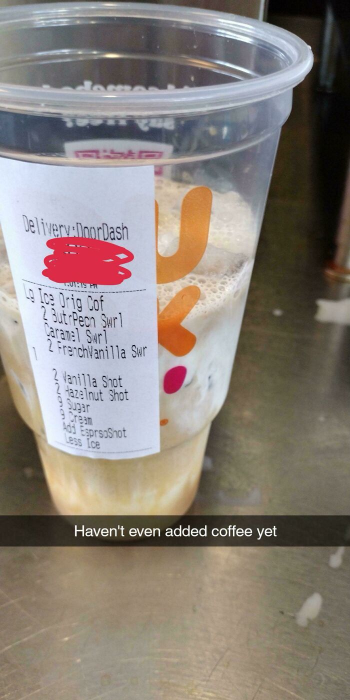 Overcomplicated coffee order on a delivery cup with humorous caption.