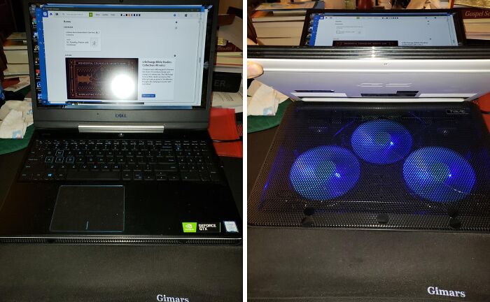 Laptop with a cooling pad featuring three blue fans, demonstrating a genius gadget tackling everyday tech problems.