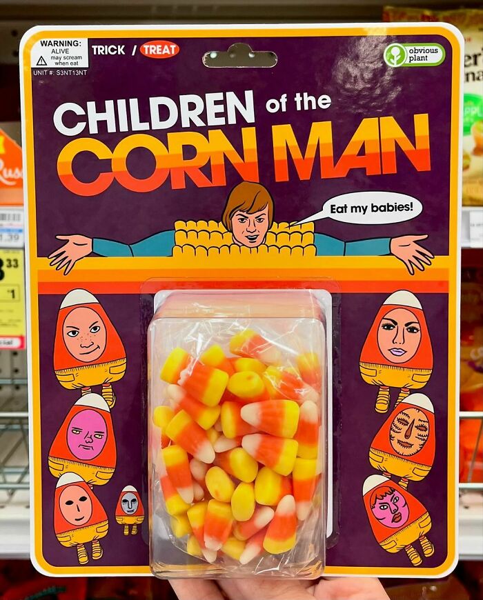 Package of fake candy corn labeled Children of the Corn Man, featuring humorous faces and packaging in a store display.