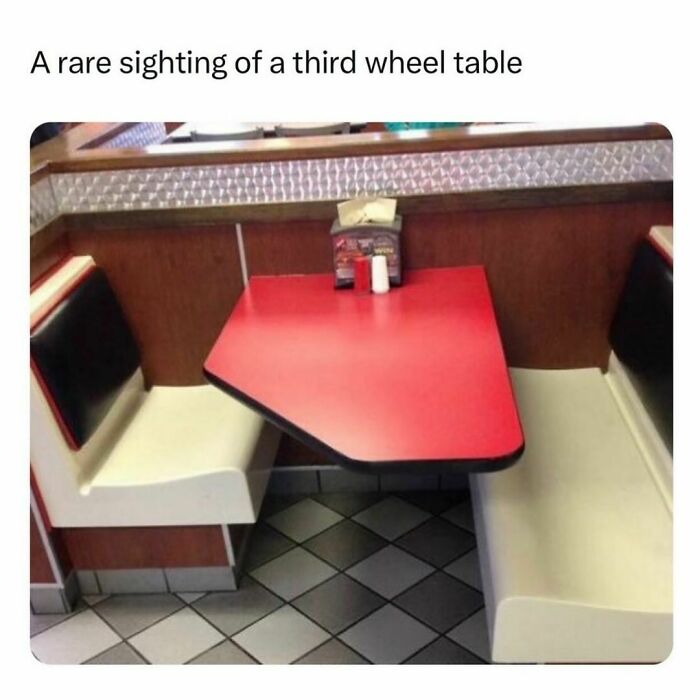A funny photo of a third wheel table seating arrangement illustrating barely holding it together humor post.
