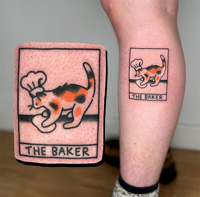 A tattoo depicting a calico cat wearing a chef's hat, titled "The Baker" in a rectangular frame. A fun and quirky tattoo idea for men who appreciate humorous and unique designs.
