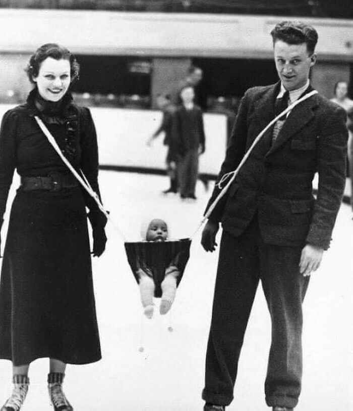 Parents Taking Their Baby Ice Skating In The 1930s