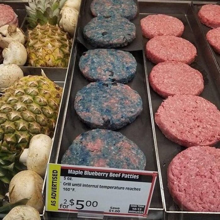 Blueberry beef patties in a grocery display showing bizarre reality twist in unusual food appearance.