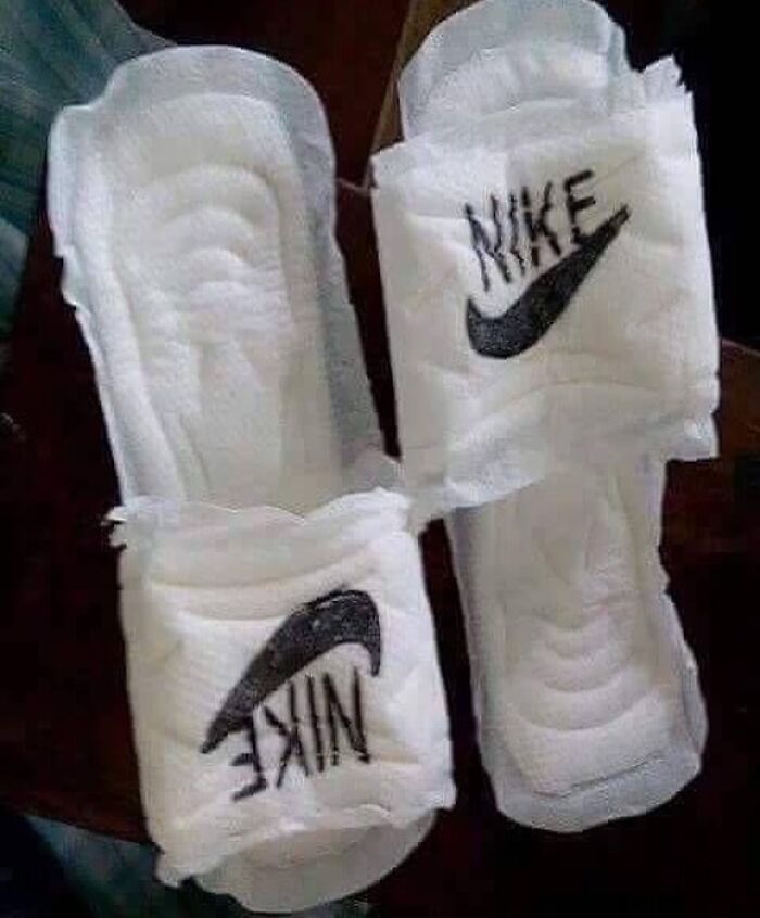 Homemade slippers made from sanitary pads featuring a fake Nike logo, showcasing bizarre and darkly hilarious reality twist.