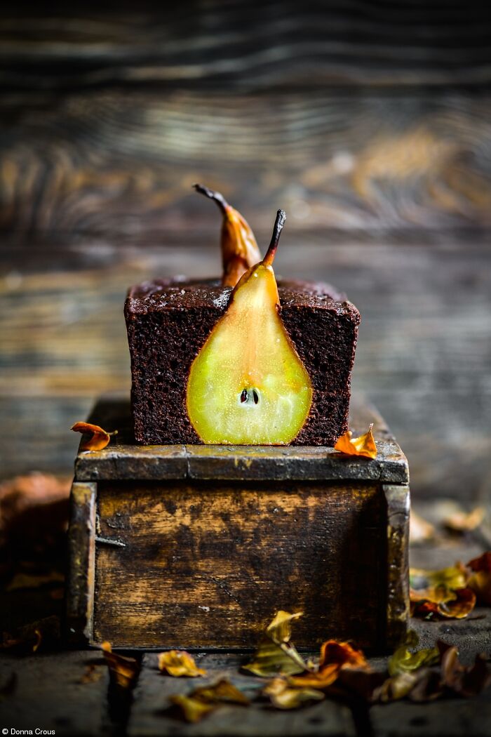 A chocolate cake with a whole pear inside, celebrating National Cake Day with Tiptree Cake Awards.