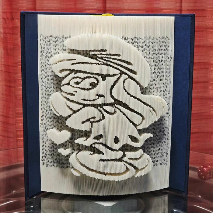 From Pages To Pixels: The Enchanting Sculptures Of Book Master