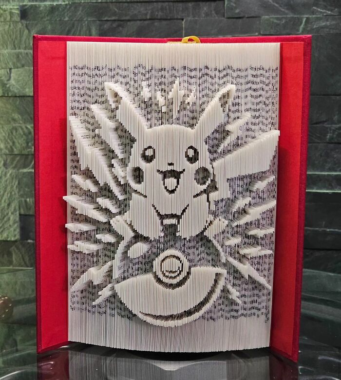 From Pages To Pixels: The Enchanting Sculptures Of Book Master