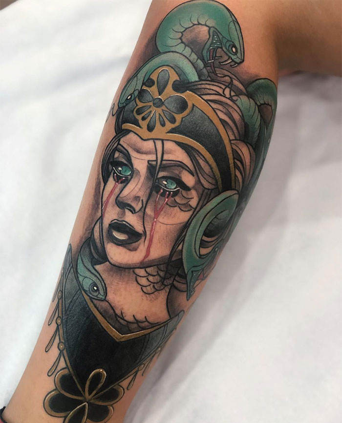 Colorful Medusa tattoo depicting beauty, power, and defiance with snakes and blood tears.