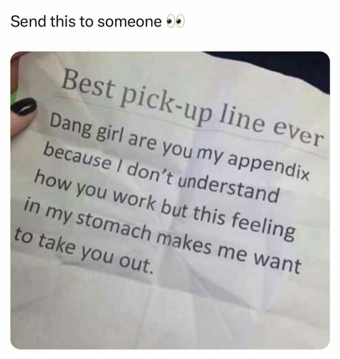 Hand holding a note with a science humor pick-up line related to the appendix, combining science and humor.