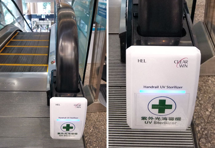 Este esterilizador ultravioleta de pasamanos en una escalera mecánica de Hong Kong