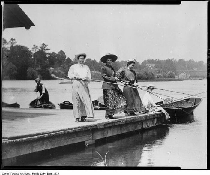 Women Fishing In A Dock, 1908. Toronto