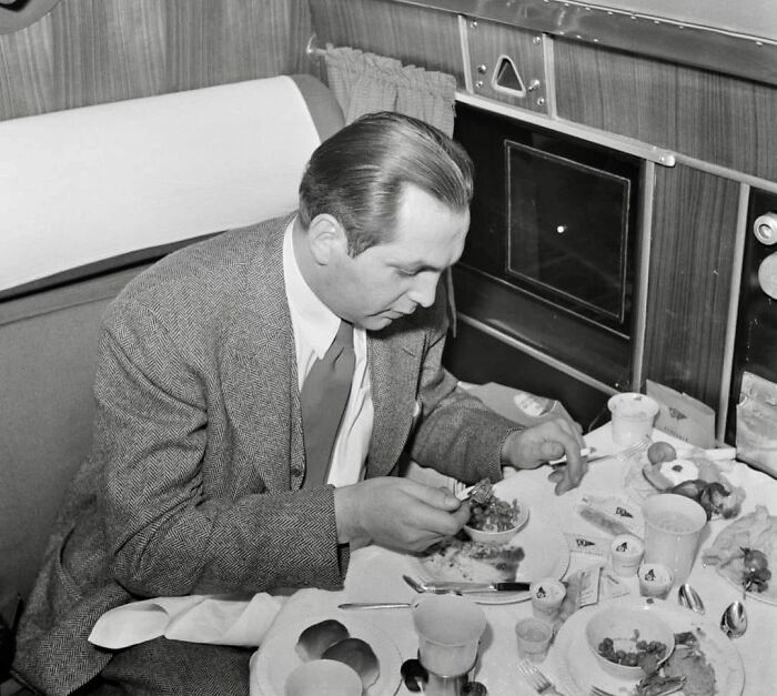 Passenger Aboard An American Airliner Enroute From Washington To Los Angeles. Photograph By John Collier In 1941