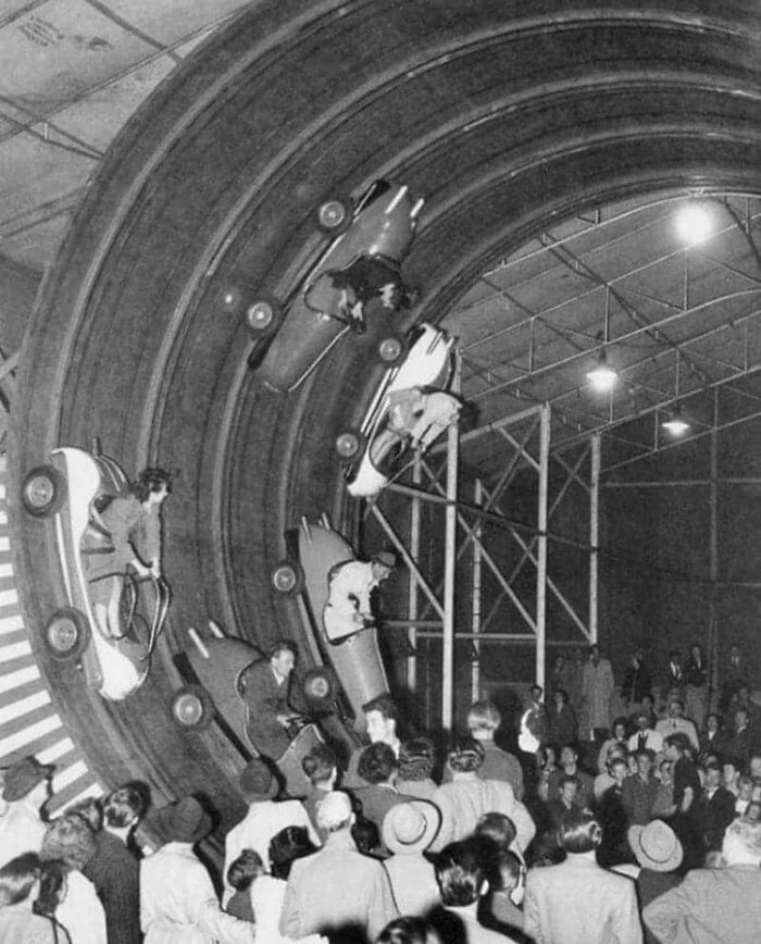 1950s, “Flying Cars” Amusement Park Ride. The Drum Rotated And You Controlled A Brake In The Car. The Cars Would Go Completely Up And Over The Loop