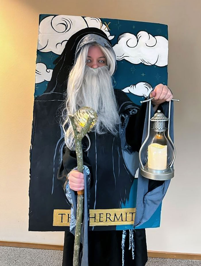 Child dressed in a creative Halloween costume holding a lantern and staff, inspired by kids' Halloween costume ideas.