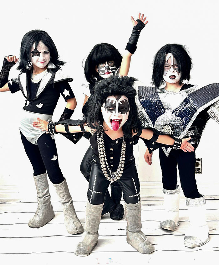 Kids in creative Halloween costumes inspired by rock stars, showcasing fun and unique kids Halloween costume ideas.