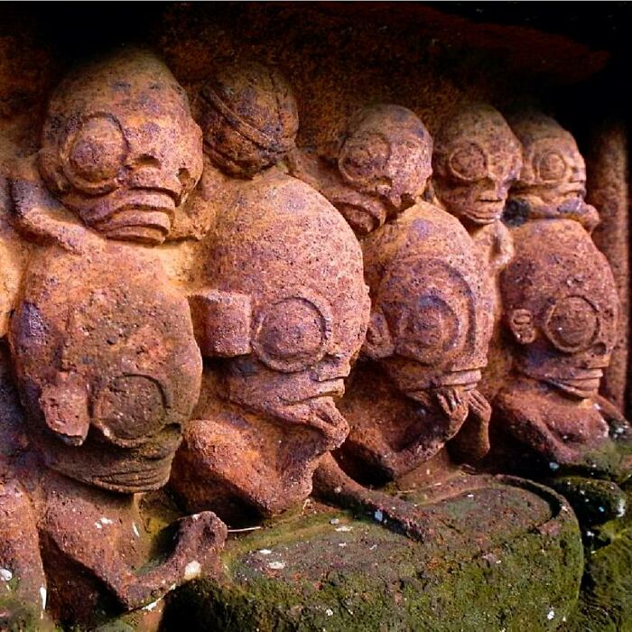 On The Remote Island Of Nuku Hiva, Located In The Marquesas Islands Of French Polynesia, Strange Stone Carvings Are Scattered Across The Rugged Landscape