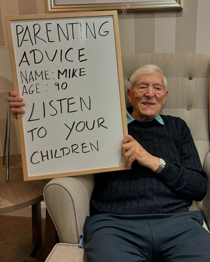 Elder holding a sign with parenting advice, part of an Instagram page dedicated to elders doling out life advice.