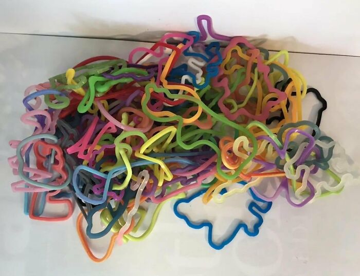 Colorful silicone fidget rings tangled together, representing short-lived internet trends that disappeared quickly.