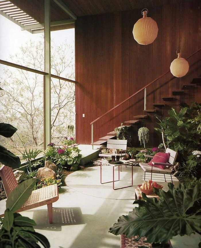 Mid-century modern interiors from the 50s to 80s featuring indoor plants, wooden walls, and minimalist furniture in natural light.