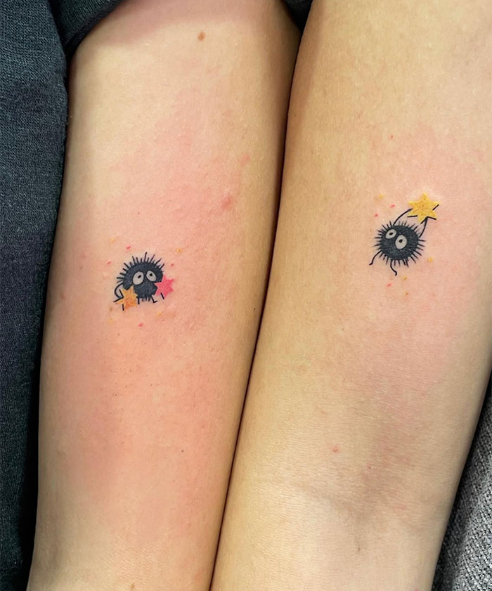 Small tattoos of cute creatures with stars on arms, showcasing creative small tattoo ideas.