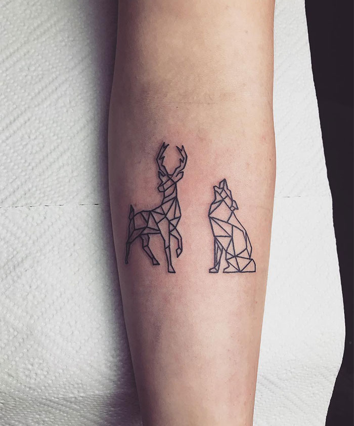 Geometric animal small tattoo on forearm, showcasing minimalist design.