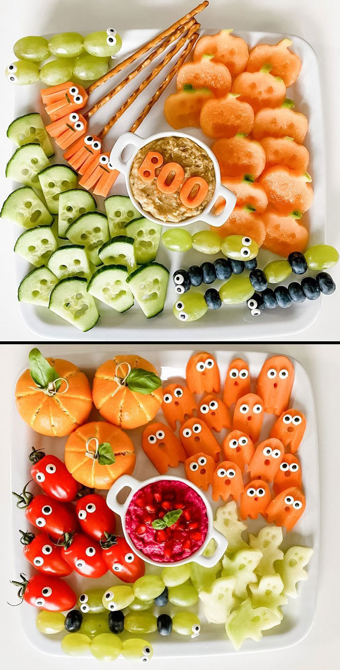 Halloween snacks platter with fruit and vegetable characters including pumpkins, ghosts, and creepy caterpillars designed for a festive treat.