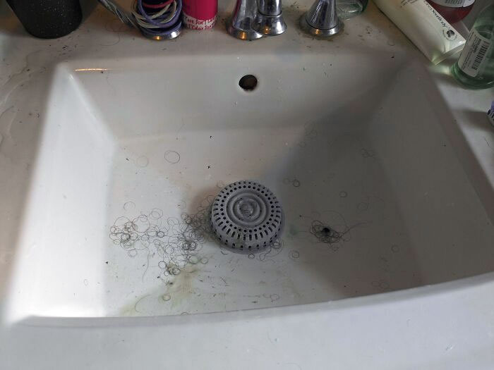 The Bathroom Sink After My Husband's Morning Routine