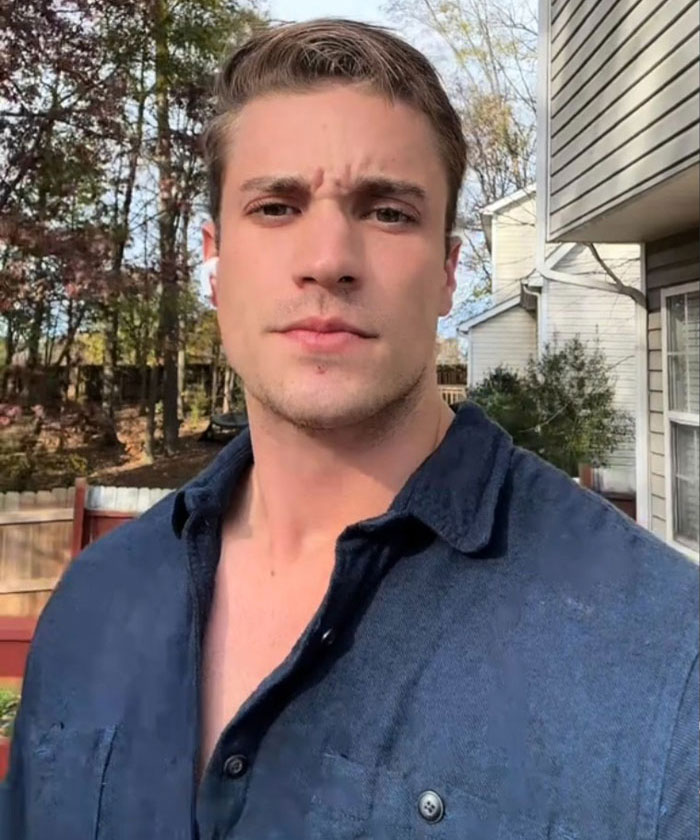 Man outside a home, wearing a dark blue shirt, related to inspection of $1,600,000 house built two years ago.