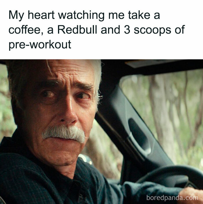 Man with surprised expression driving, reflecting on gym meme about coffee, Redbull, and pre-workout.