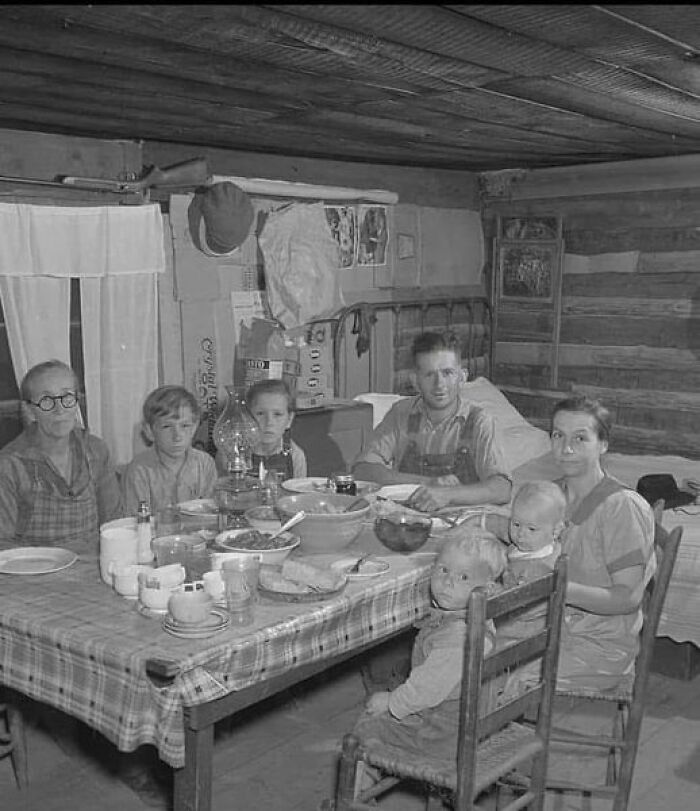 A Family From The Farm Enjoying Dinner. Tennessee's Claiborne County, 1940
