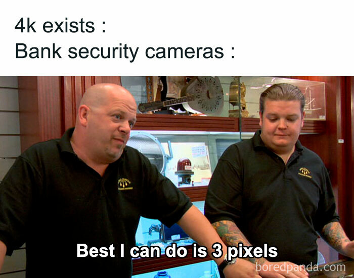 IT meme showing two men in a shop, joking about low-quality bank security cameras compared to 4k.