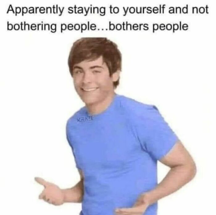 Man in a blue shirt with a confused expression, illustrating a relatable post about personal boundaries.