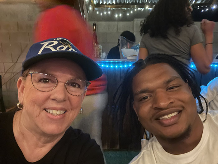 Jamal and Wanda supporting their favorite sports team.