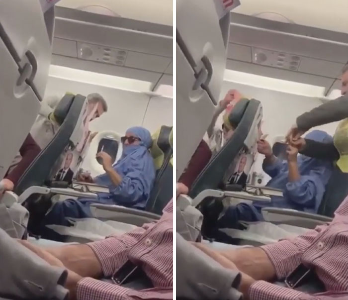 Passengers interacting on a plane, with one wearing blue and another holding a large photo, highlighting annoying behavior.