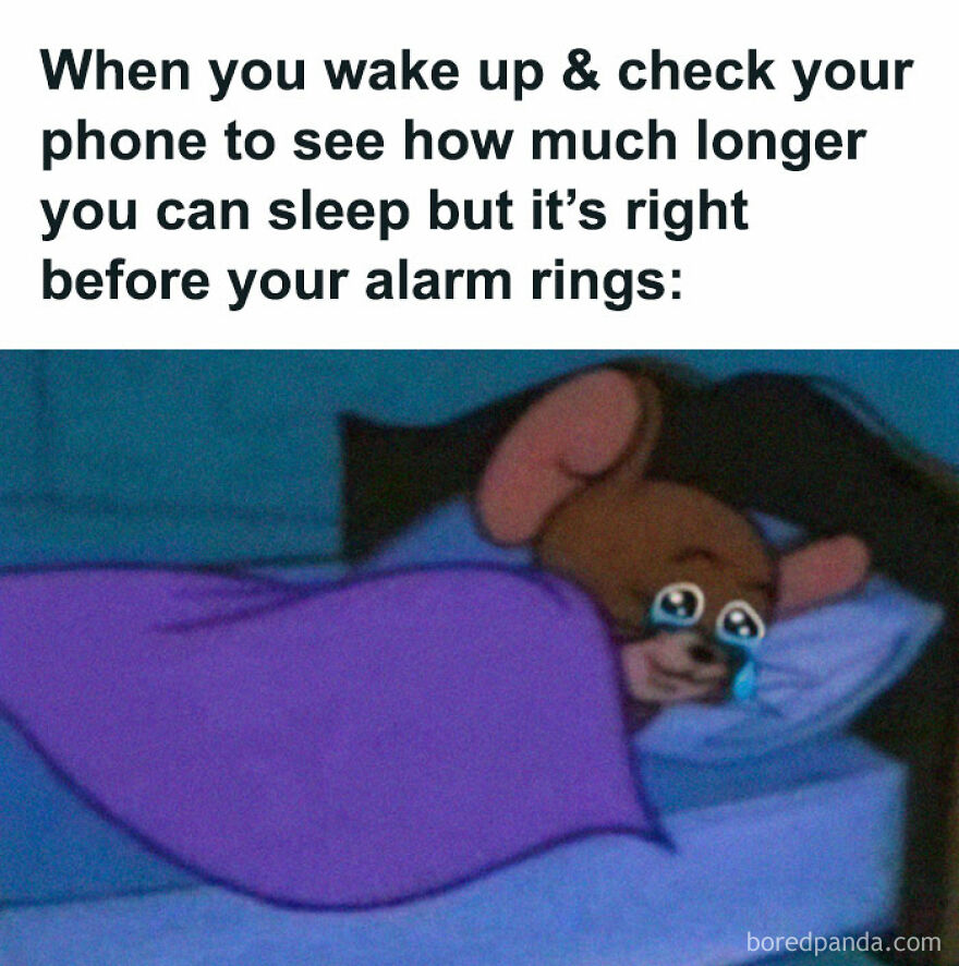 Cartoon mouse under blanket, crying with laughter as alarm time approaches; perfect funny memes for a laugh.