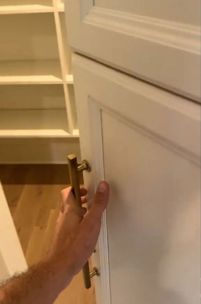 Inspector reveals issues in $1,600,000 home's cabinet with gold handle, highlighting unexpected condition surprises.