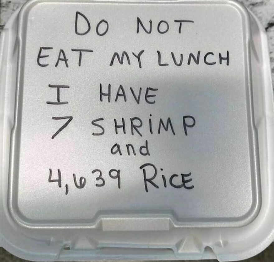 Takeout box with a funny message about having 7 shrimp and 4,639 rice, perfect for a laugh.