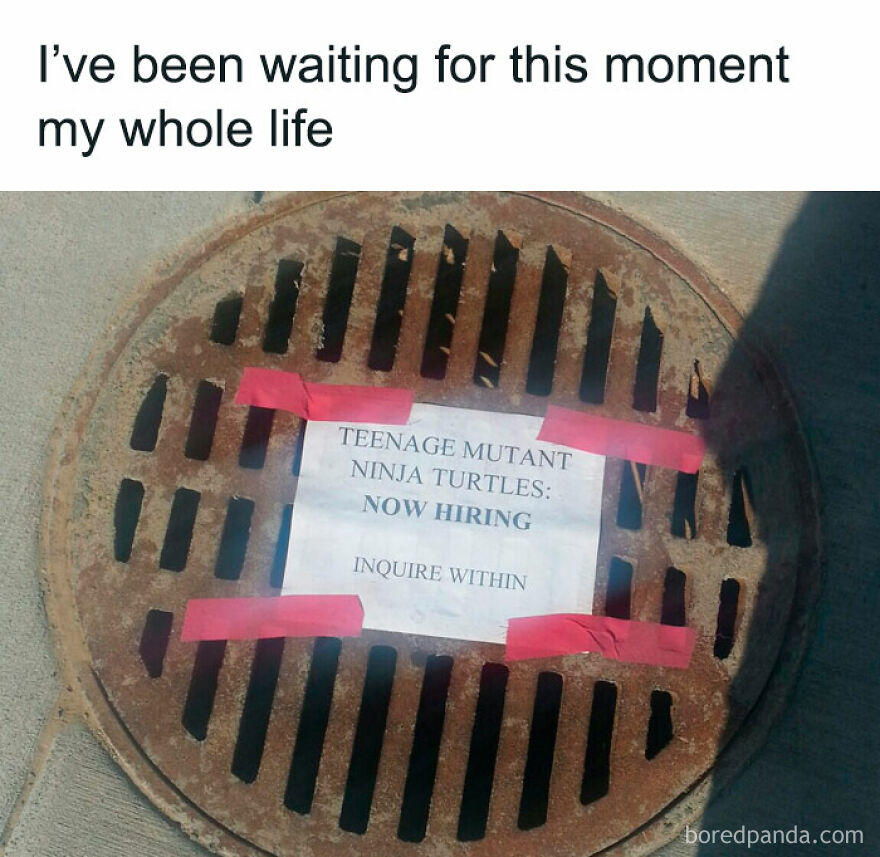 Sewer grate with a sign saying "Teenage Mutant Ninja Turtles: Now Hiring," taped on with red tape, adding humor.
