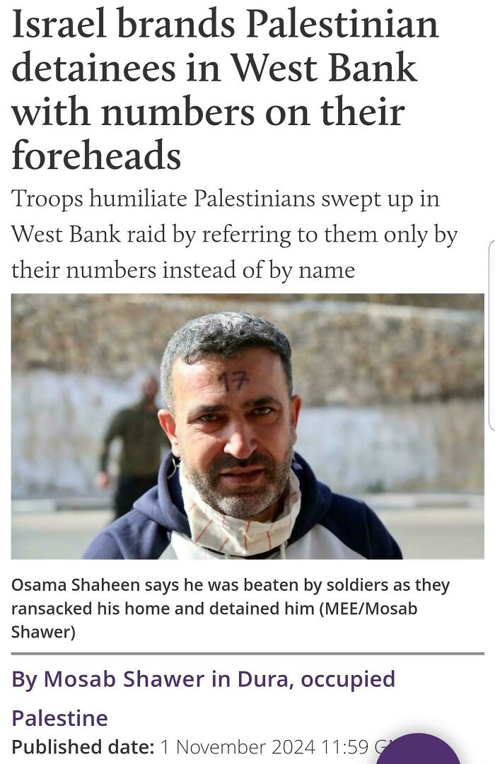 Man with forehead number in West Bank, highlighting boring dystopia concerns.
