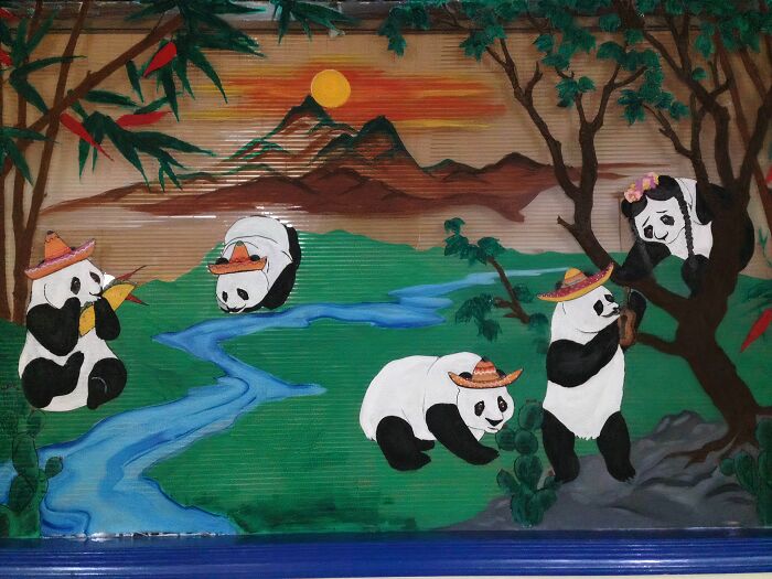 Pandas wearing hats in a colorful landscape, illustrating creative building conversions in art.