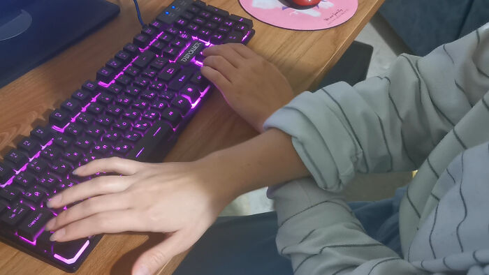 When Gaming, My Wife Uses Her Keyboard With Crossed Arms